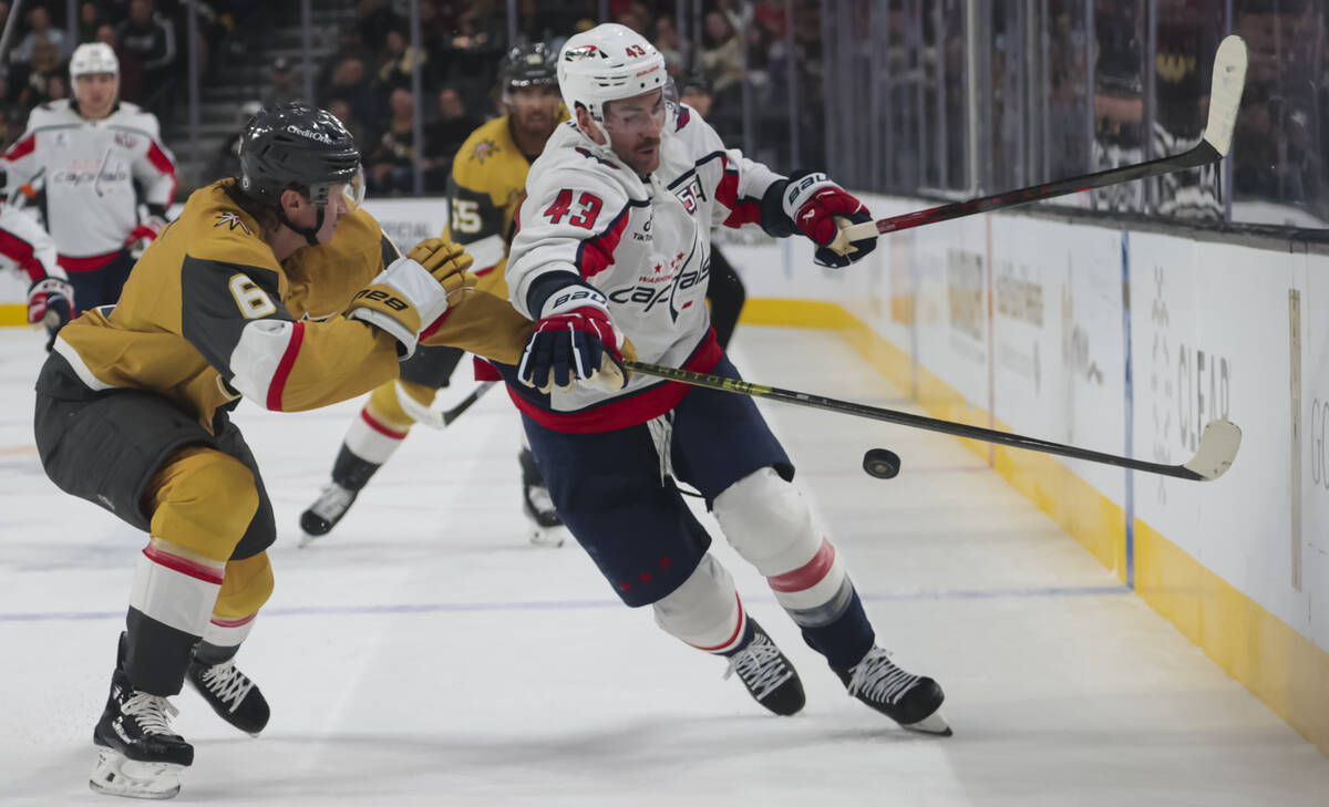 Washington Capitals right wing Tom Wilson (43) and Golden Knights defenseman Kaedan Korczak (6) ...