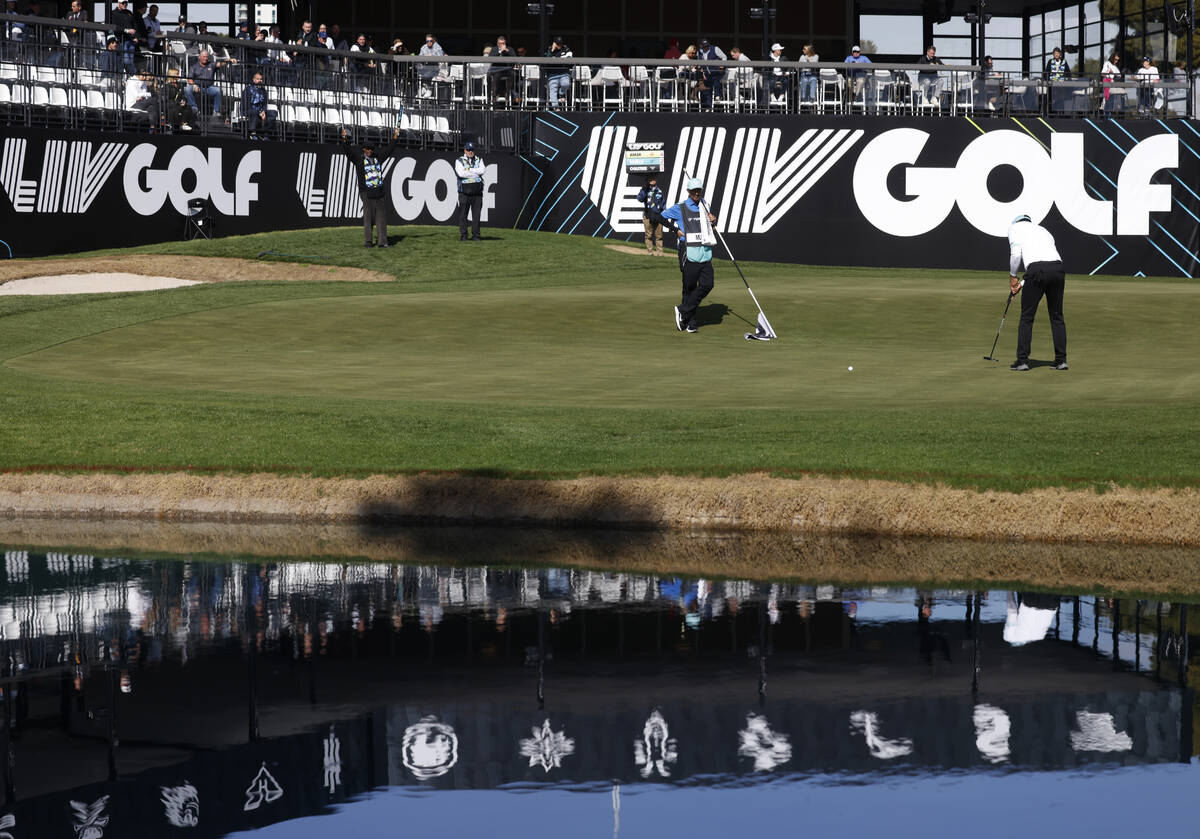 Sebastian Munoz of team Torque GC watches his putt on the 18th green during the second round of ...