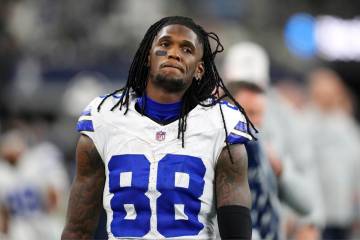 Dallas Cowboys wide receiver CeeDee Lamb walks on the sidelines during a football game against ...