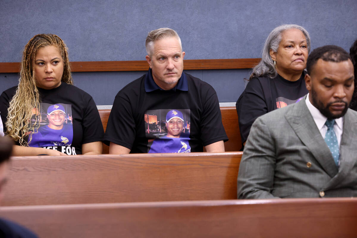 Relatives and friends of Brandon Durham, who was killed by police after reporting a break-in, a ...