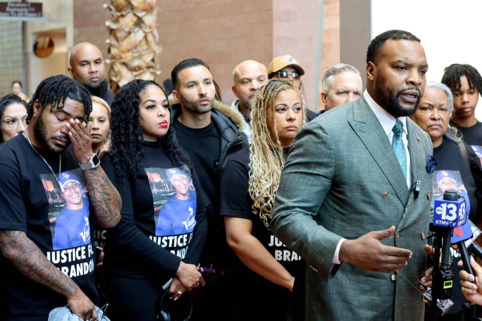 Family members of Brandon Durham, who was killed by police after reporting a break-in, includin ...