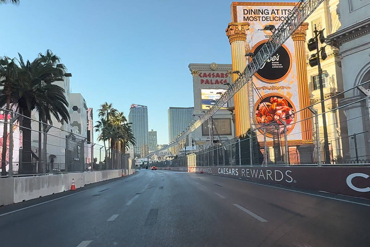 Las Vegas Boulevard with Las Vegas Grand Prix track lighting and barriers in place ahead of the ...