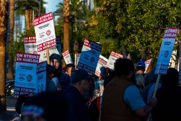 Culinary Local 226 workers on strike outside the Virgin Hotels after they and management failed ...