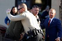 Metro officers greet each other before the ribbon cutting ceremony for the newly opened Wellnes ...