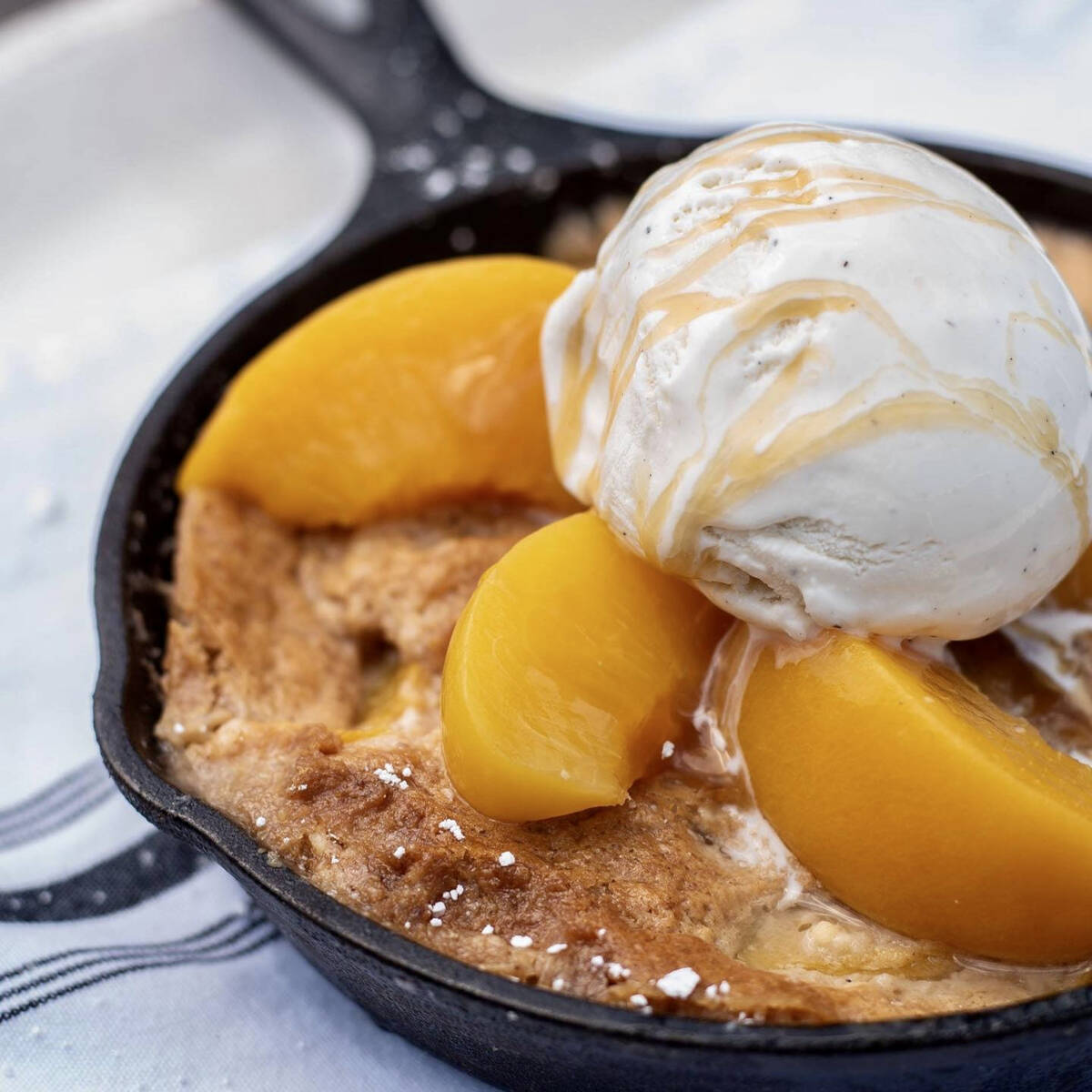 Mama Aldean's peach cobbler from Jason Aldean's Kitchen + Bar set to open Dec. 2, 2024, on the ...