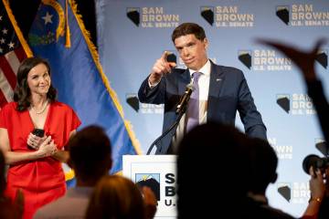 Republican senatorial candidate Sam Brown, right, gives a celebratory speech during his Electio ...