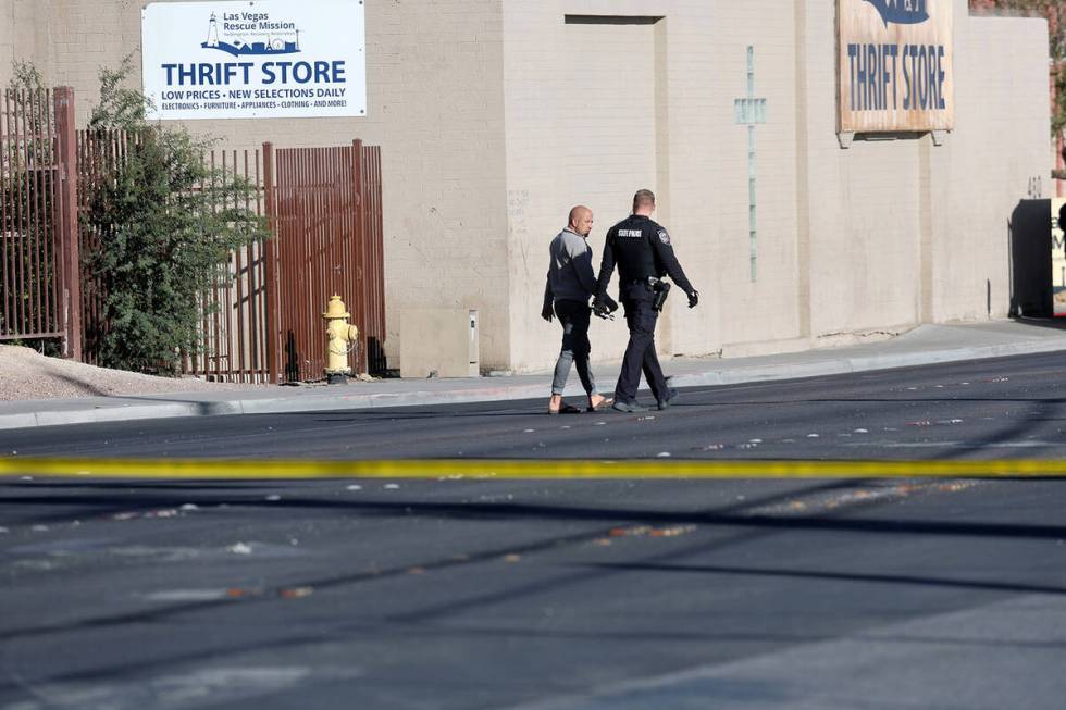 Las Vegas police investigate the scene of a crash involving a pedestrian and semi-truck on West ...