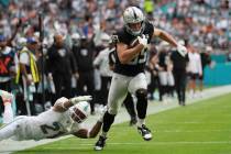 Las Vegas Raiders tight end Brock Bowers (89) runs for a touchdown during the second half of an ...