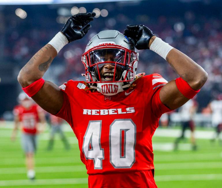 UNLV defensive back Daego Albert (40) is pleased with another great kickoff coverage against th ...