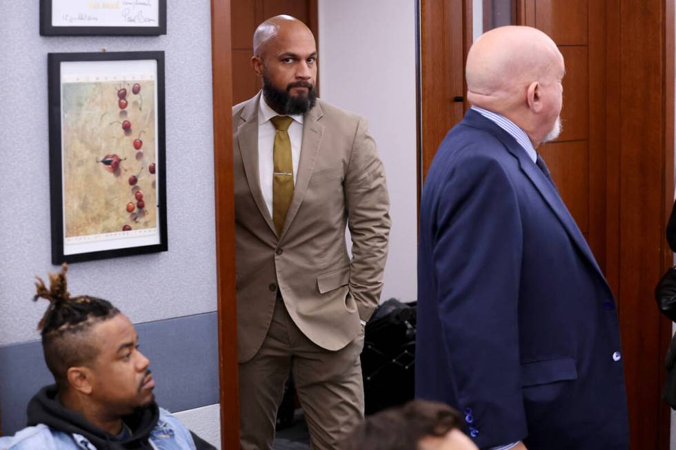 Metropolitan Police Department Sgt. Kevin Menon arrives in court at the Regional Justice Center ...