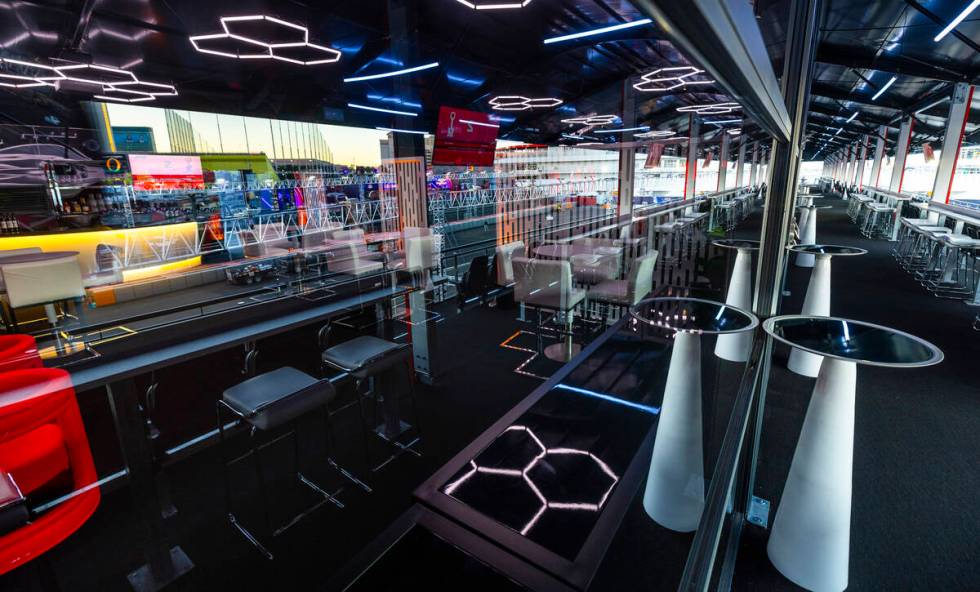 A race viewing area and the cool interior are seen from the windows lining the third floor of t ...