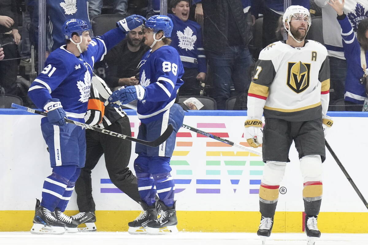 Toronto Maple Leafs' William Nylander (88) celebrates with John Tavares (91) after scoring his ...