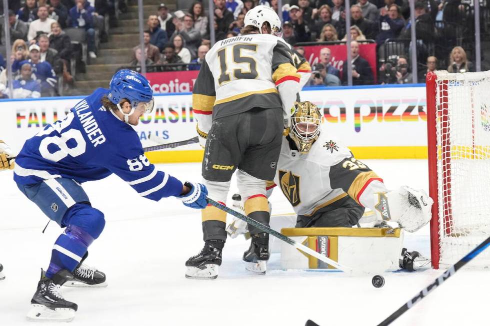 Toronto Maple Leafs' William Nylander (88) takes a shot on Vegas Golden Knights' goaltender Adi ...