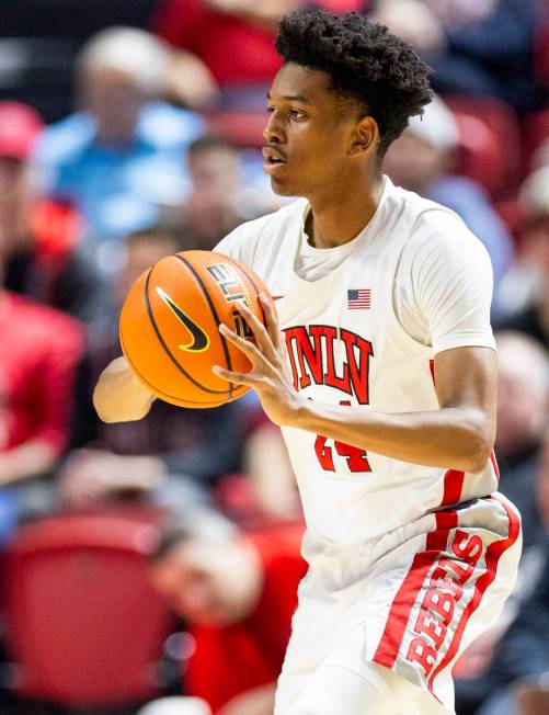 UNLV guard DeMarion Yap (24) looks to pass the ball during the college basketball game against ...