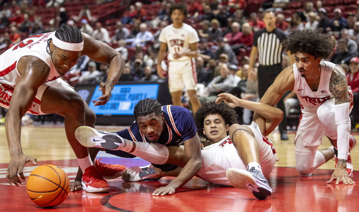 From left: UNLV forward Jacob Bannarbie, Pepperdine Waves guard Zion Bethea, UNLV forward Jalen ...