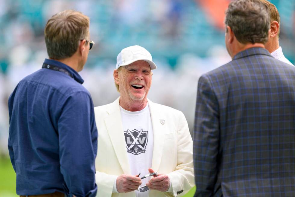 From left, Miami Dolphins vice chairman, president and chief executive officer Tom Garfinkel, L ...