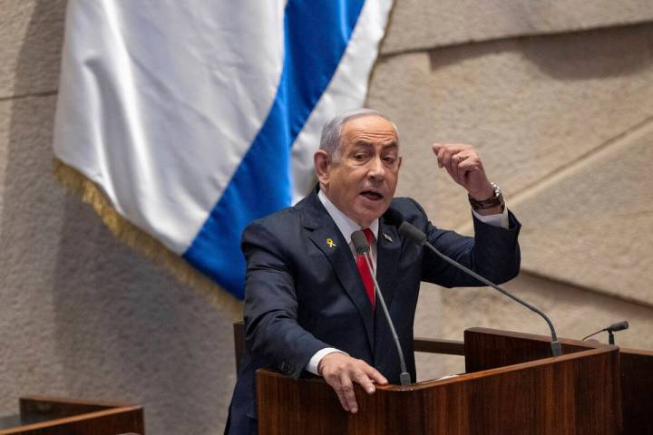 Israel's Prime Minister Benjamin Netanyahu addresses lawmakers in the Knesset, Israel's parliam ...