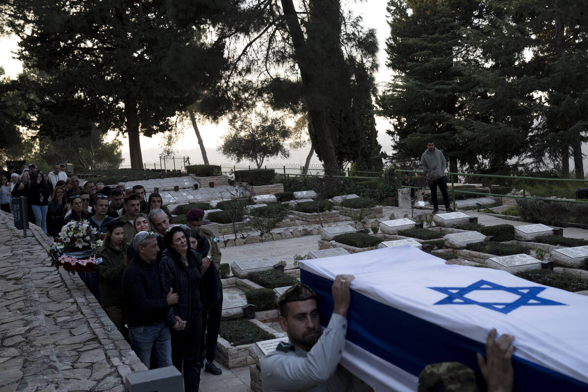 The family of Israeli Defense Forces Sgt. First Class (res.) Roi Sasson, who was killed in acti ...