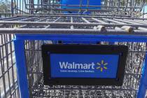 A Walmart Supercenter cart sits outside of the store on Feb. 20, 2024, in Hallandale Beach, Flo ...