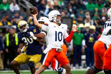 Virginia quarterback Anthony Colandrea (10) throws a pass during first half of an NCAA college ...