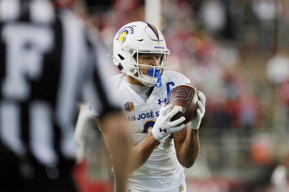 San Jose State wide receiver Nick Nash secures a pass during the second half of an NCAA college ...