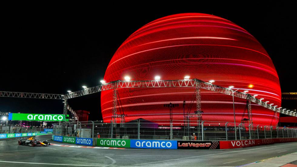 Red Bull driver Sergio Perez turns the corner at the Sphere during the first Formula One openin ...