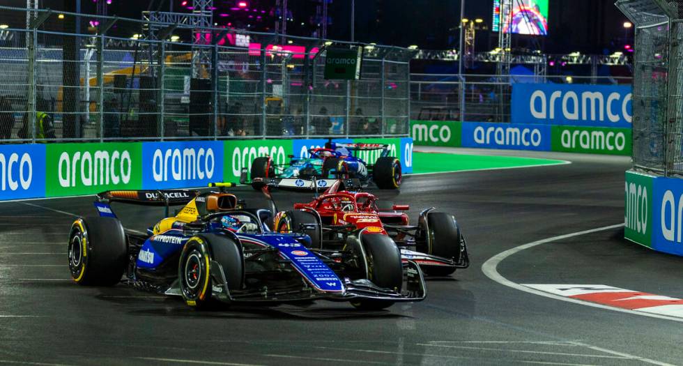 Williams driver Franco Colapinto leads Ferrari driver Charles Leclerc around a turn at the Sphe ...