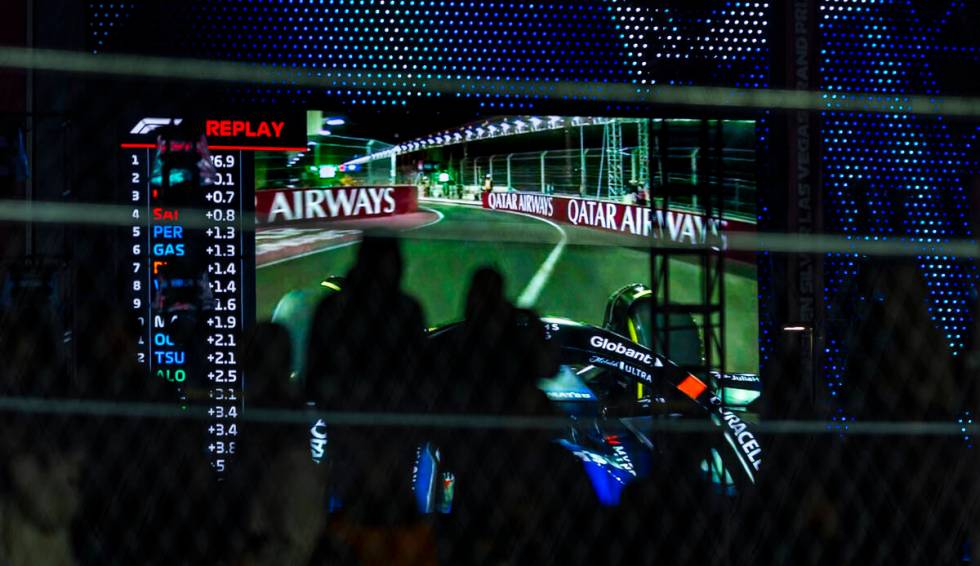 Fans watch from the stands about the Sphere during the Formula One opening practice session of ...