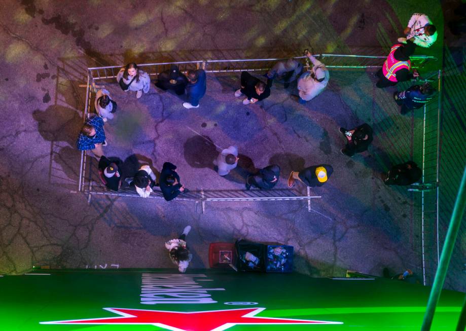 People stand in line to climb the Heineken tower to check out the view during the Formula One o ...