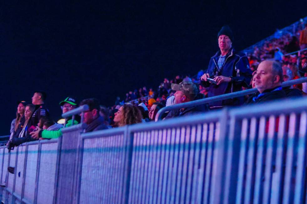 Formula 1 fans watch drivers zoom by the grandstands during the first open practice ahead of th ...