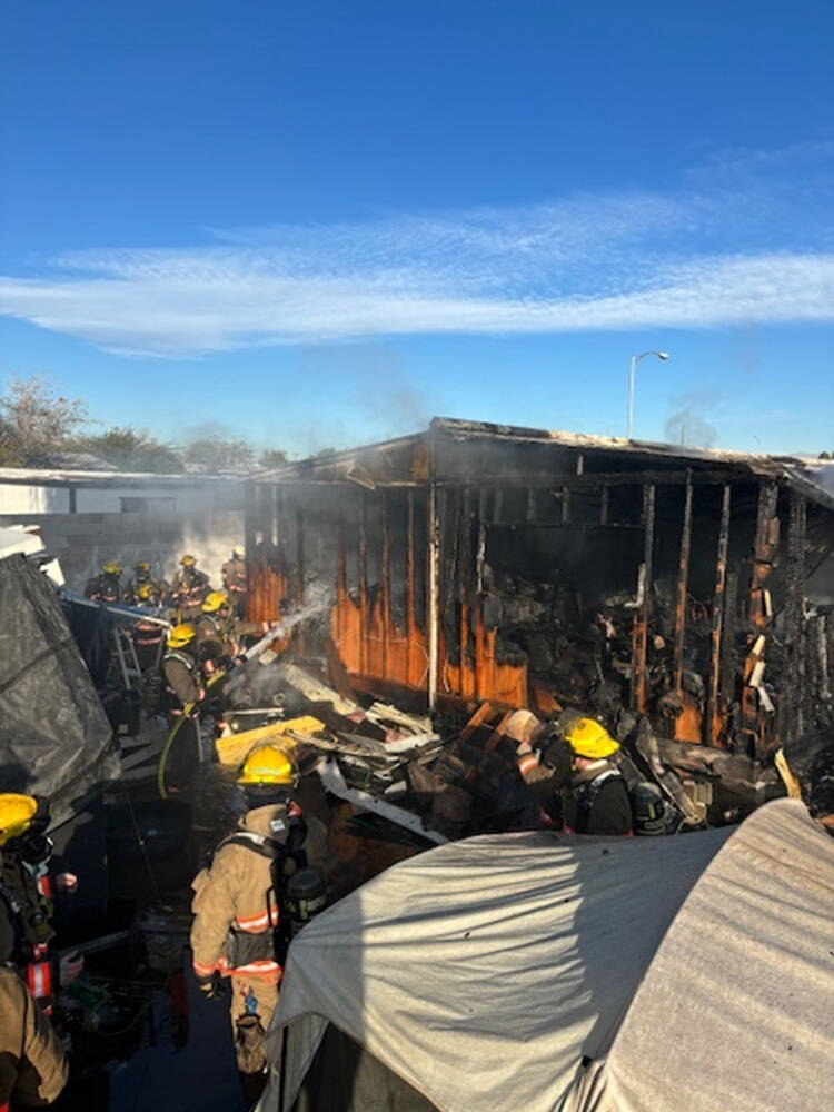 Crews battle a house fire Thursday, Nov. 21, 2024, on the 4700 block of&#xa ...