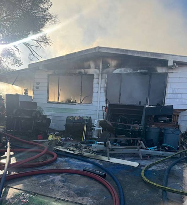 Crews battle a house fire Thursday, Nov. 21, 2024, on the 4700 block of&#xa ...