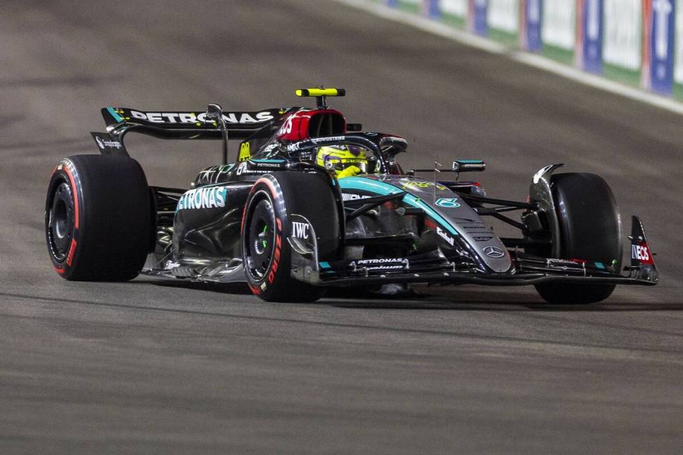 Mercedes driver Lewis Hamilton turns corner one during the third practice round for the Formula ...