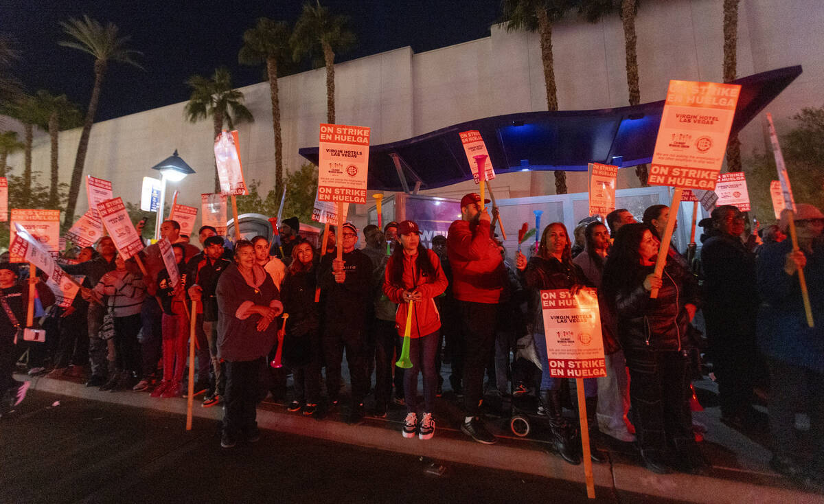 Culinary Workers Union members and Virgin Hotels workers protest outside of the Virgin Hotels, ...