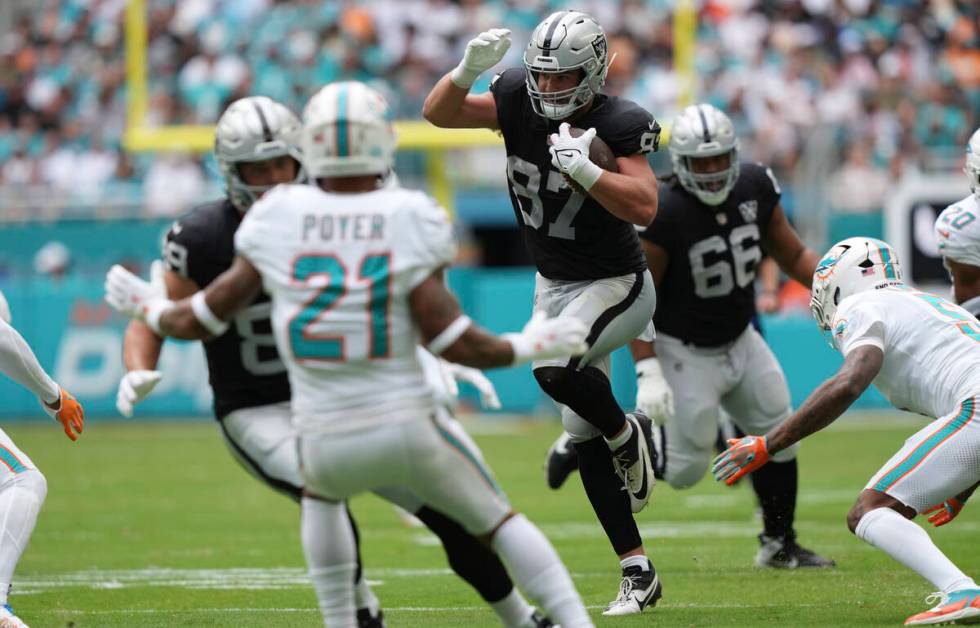 Las Vegas Raiders tight end Michael Mayer runs during the first half of an NFL football game ag ...