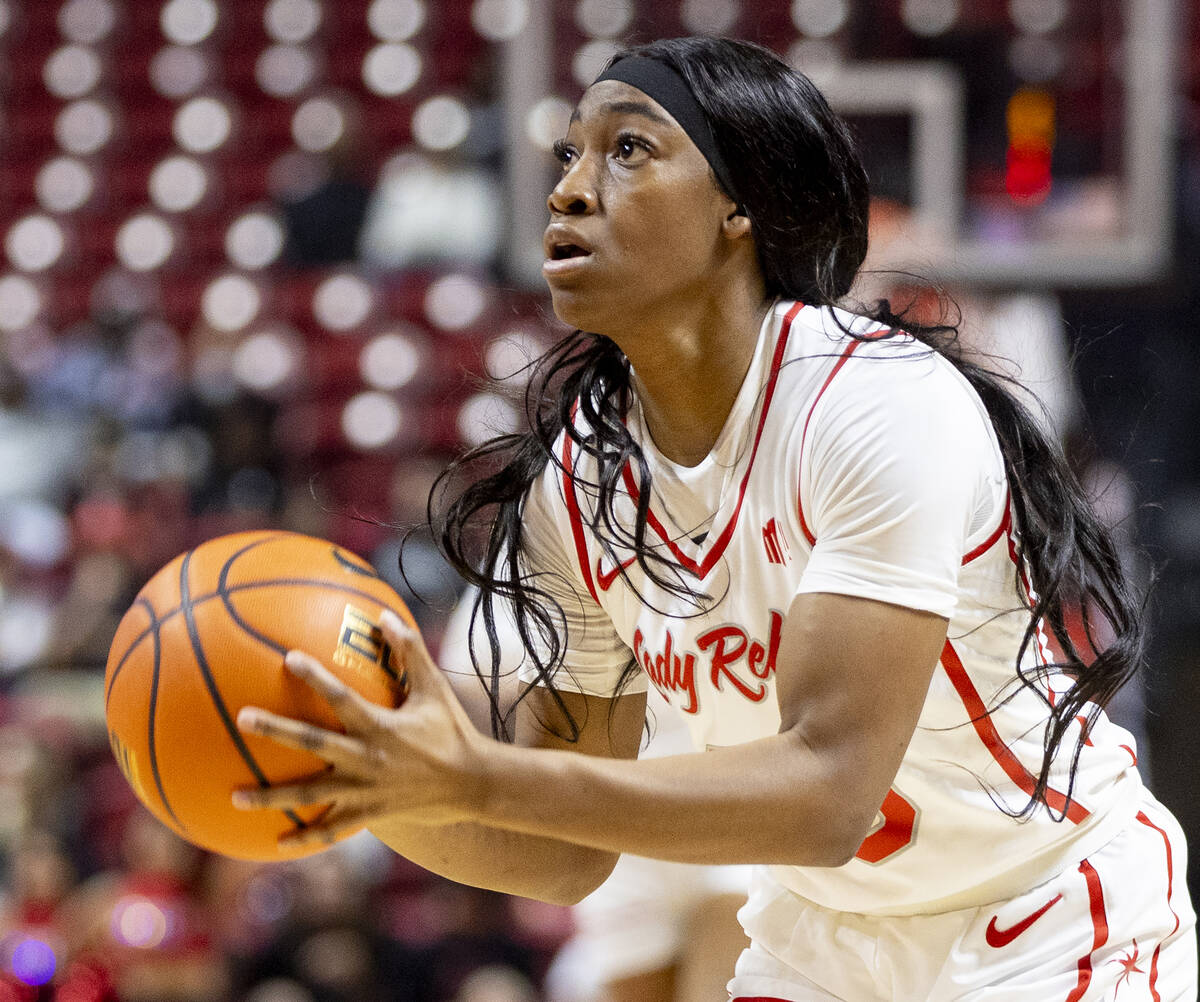 UNLV guard Amarachi Kimpson prepares to shoot during the college basketball game against the Ok ...