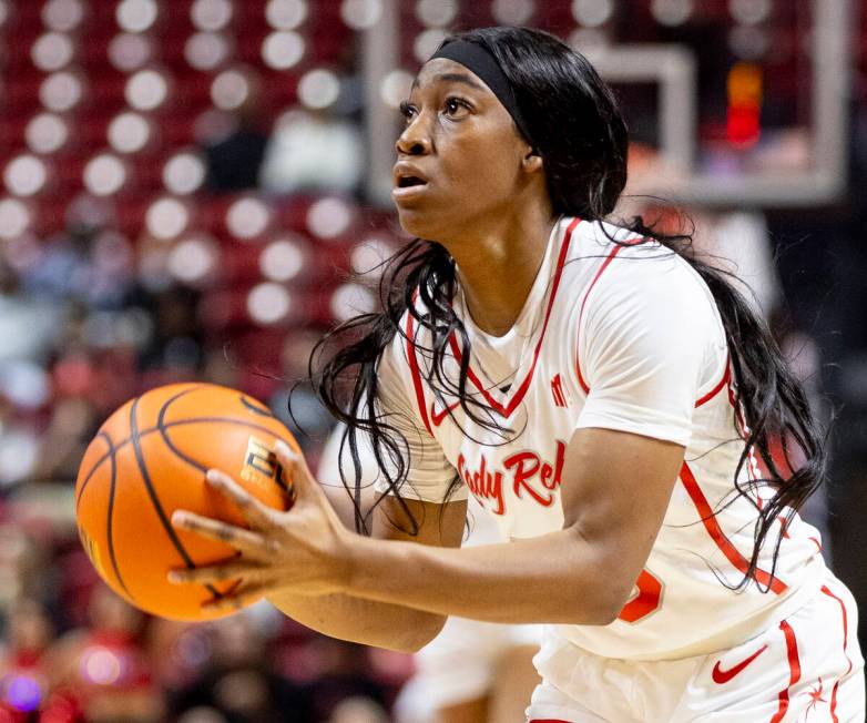 UNLV guard Amarachi Kimpson prepares to shoot during the college basketball game against the Ok ...