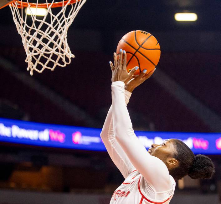 UNLV guard Aaliyah Alexander attempts a layup during the college basketball game against the Ok ...