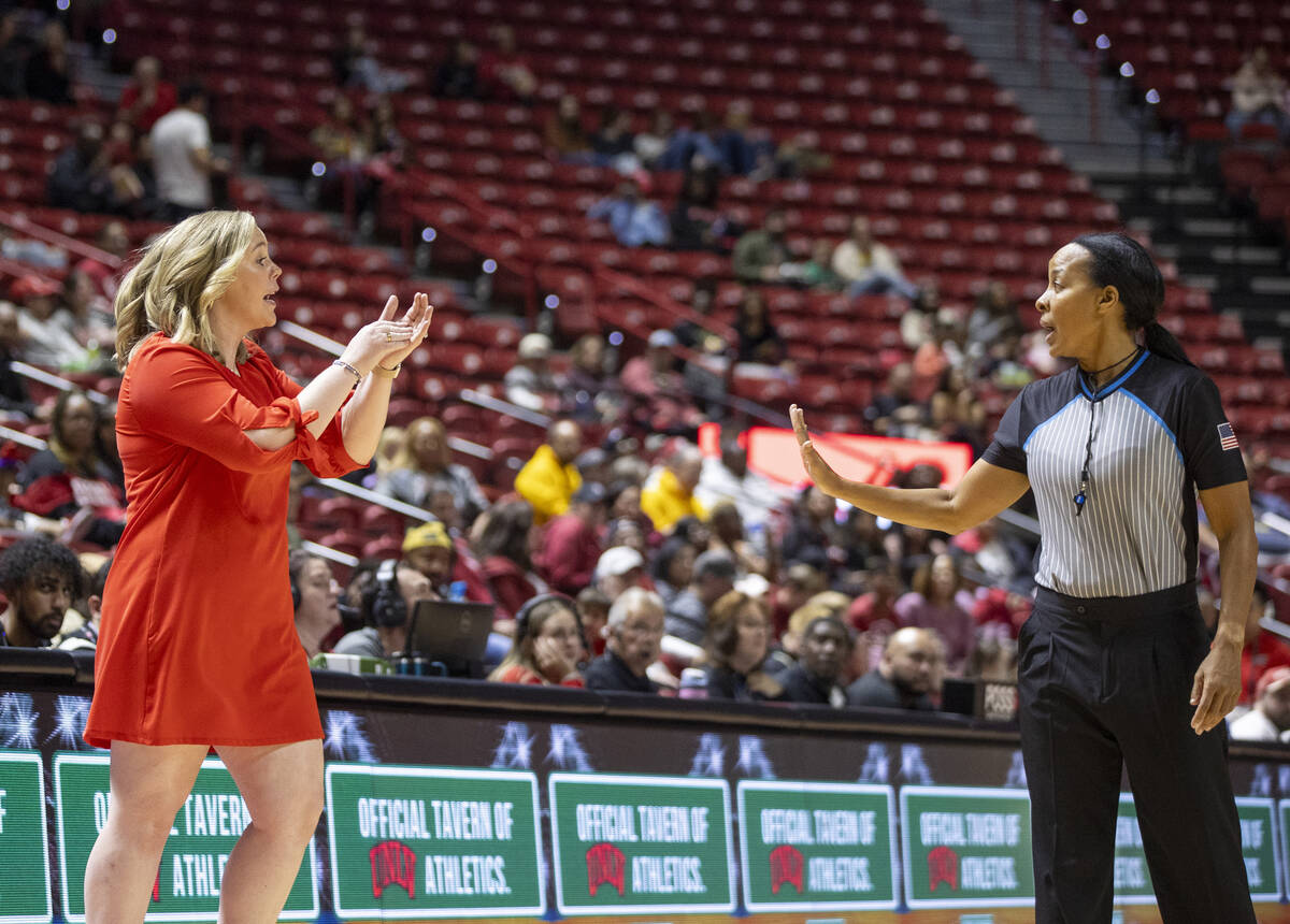 UNLV head coach Lindy La Rocque calls a timeout for the referees to review the previous penalty ...