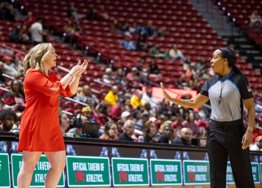 UNLV head coach Lindy La Rocque calls a timeout for the referees to review the previous penalty ...