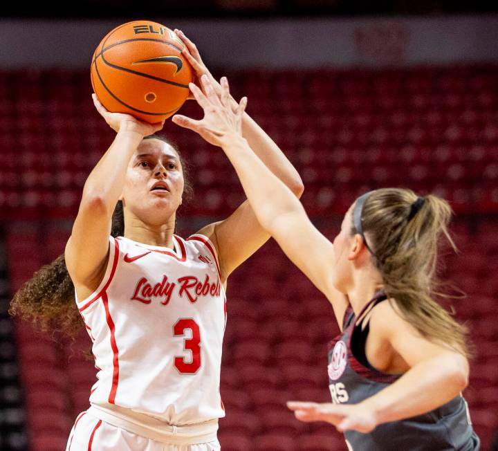 UNLV guard Kiara Jackson (3) attempts a shot during the college basketball game against the Okl ...