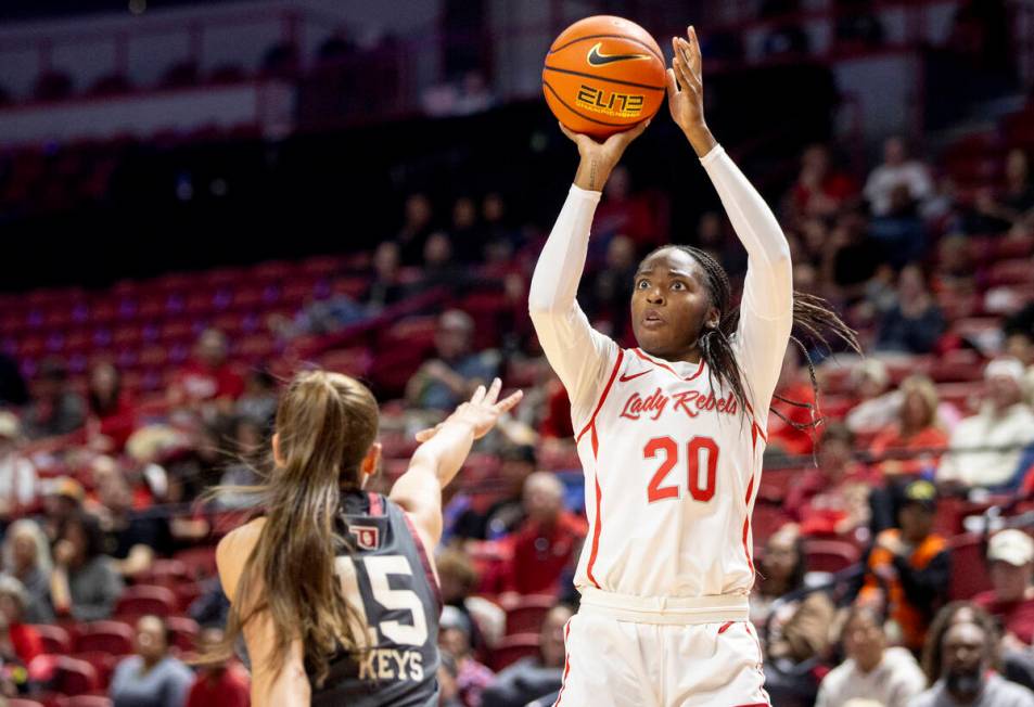 UNLV forward Macie James (20) attempts a shot during the college basketball game against the Ok ...