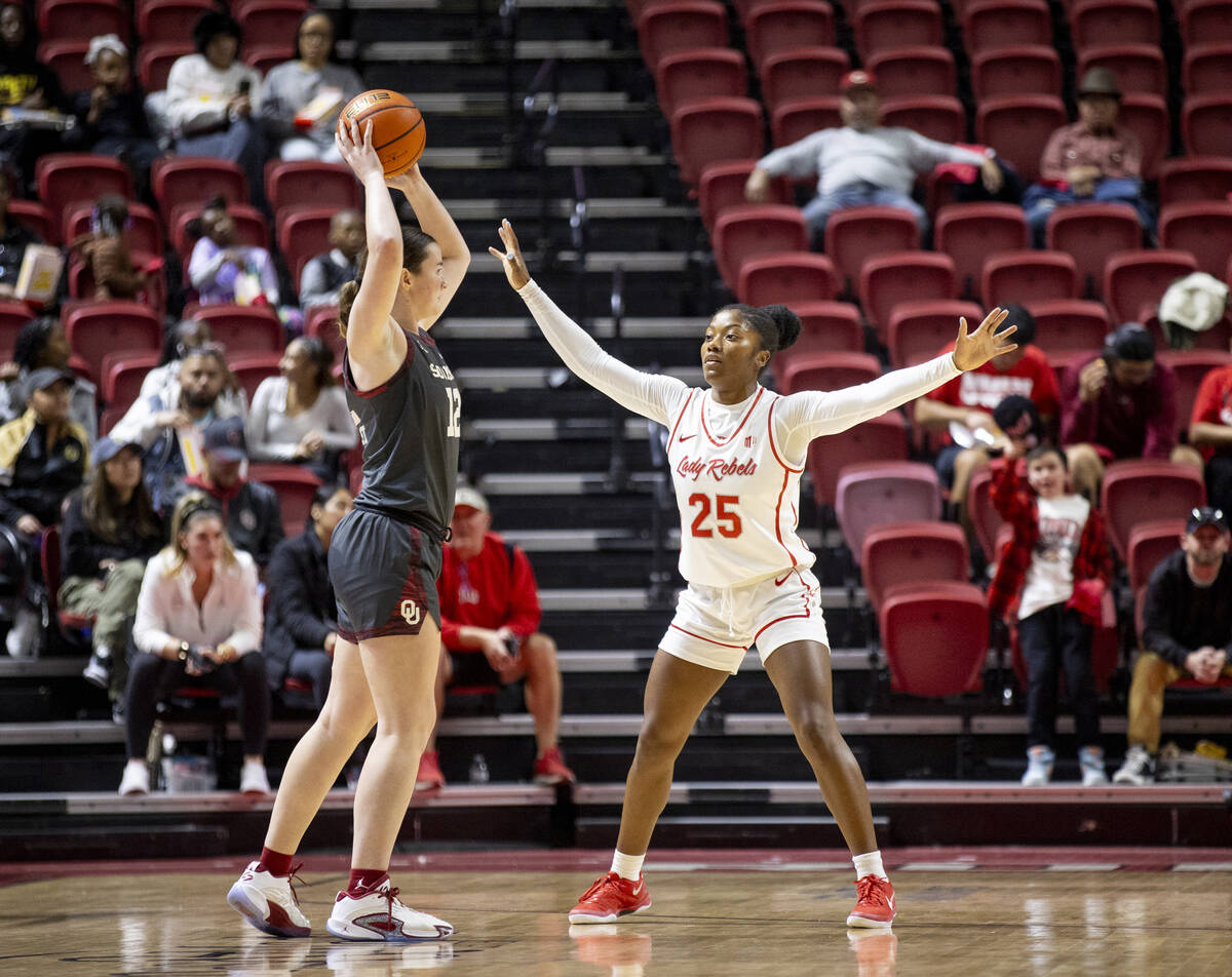 UNLV guard Aaliyah Alexander (25) guards Oklahoma Sooners guard Payton Verhulst (12) during the ...