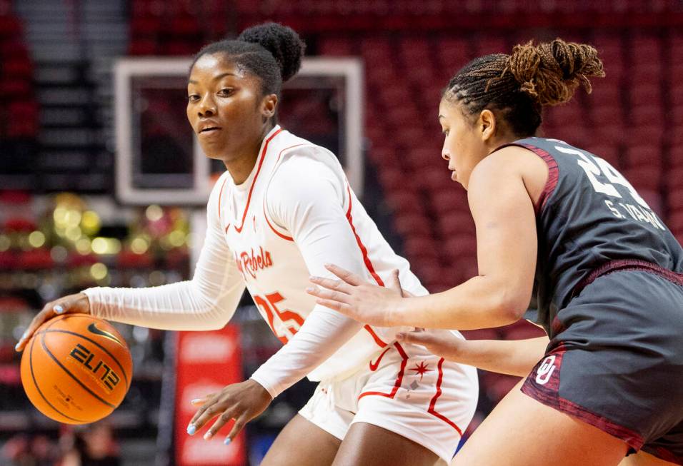 UNLV guard Aaliyah Alexander (25) competes against Oklahoma Sooners forward Skylar Vann (24) du ...