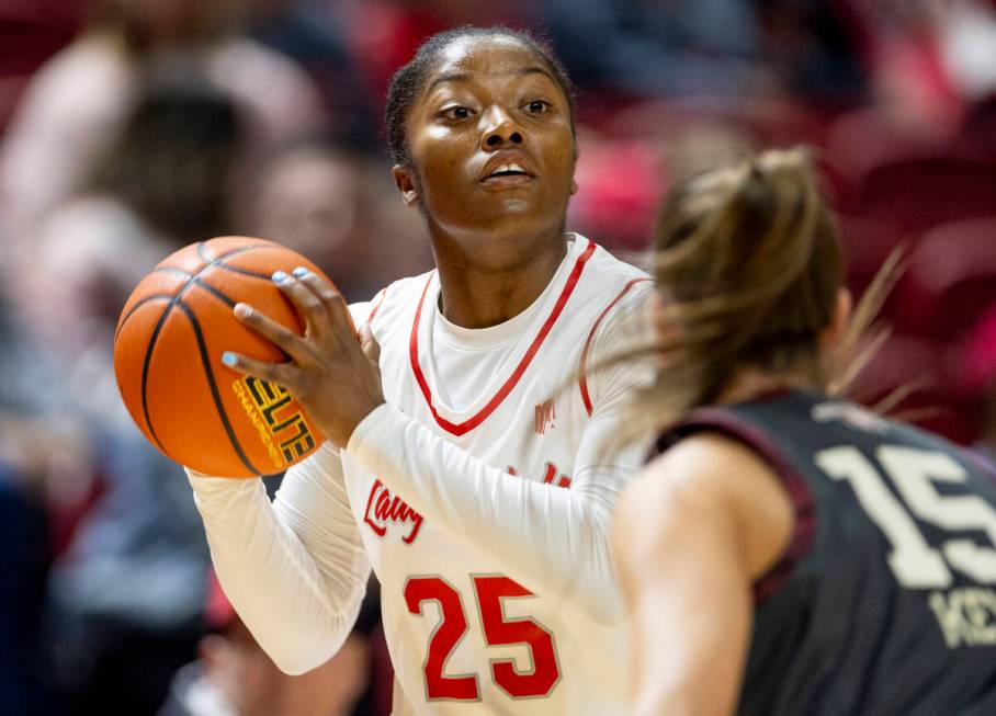 UNLV guard Aaliyah Alexander (25) looks to pass the ball during the college basketball game aga ...