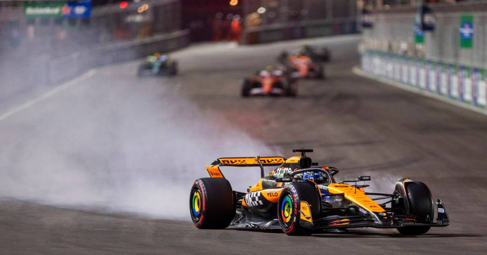 McLaren driver Oscar Piastri breaks hard into turn one during the third practice round for the ...