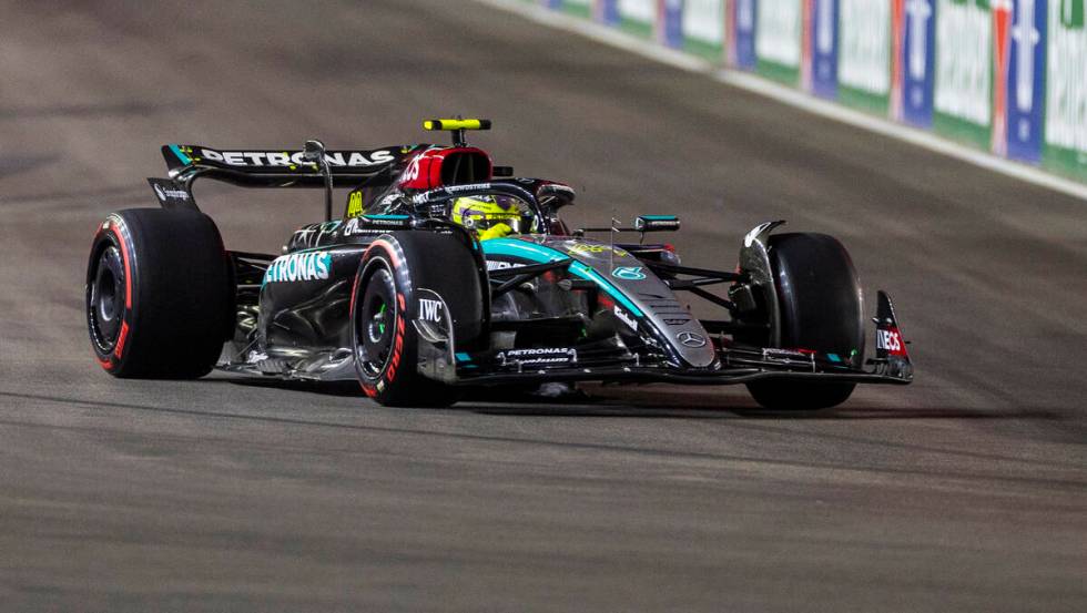 Mercedes driver Lewis Hamilton turns corner one during the third practice round for the Formula ...