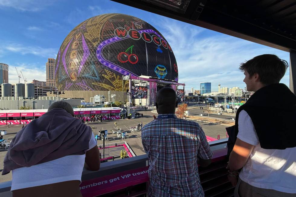 Guests on the third floor of T-Mobile's Club Magenta at Sphere's Las Vegas Grand Prix spectator ...