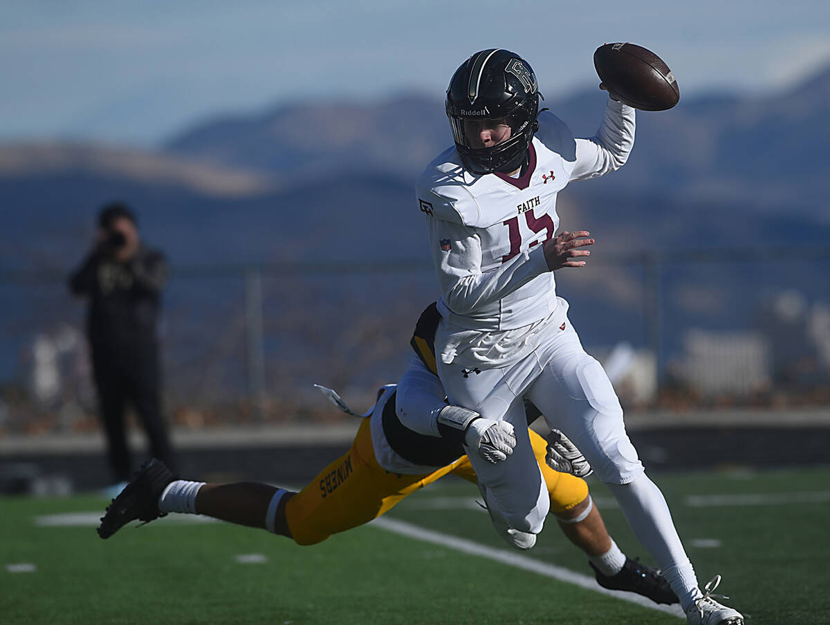 Faith Lutheran quarterback Alex Rogers tries to evade the rush from Bishop Manogue during the C ...