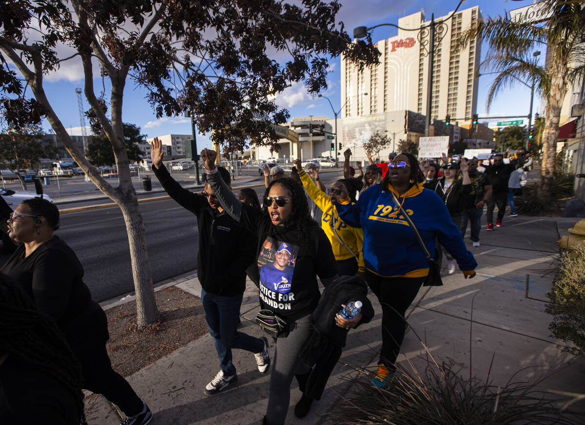 Diane Wright, sister of Brandon Durham, marches along Main Street during a rally for Brandon Du ...